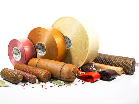 Boyaux de la marque Fabios présentés de différentes manières : certains en enveloppes individuelles, d’autres en film ou déjà garnis, illustrant les options pour la charcuterie et la saucisserie